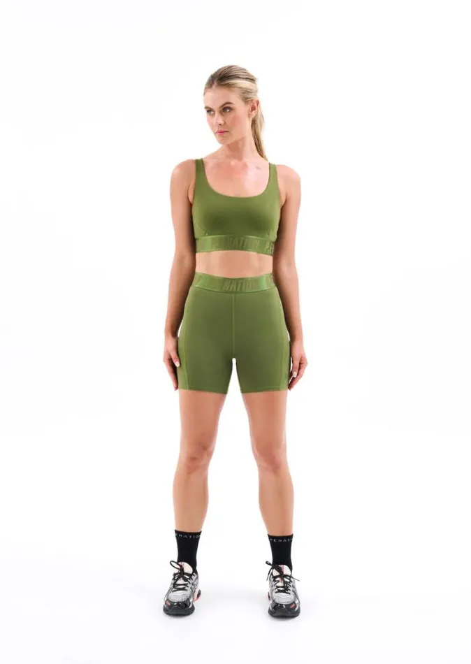 Shop BACKCHECK BIKE SHORT IN PESTO PE Nation Shorts
