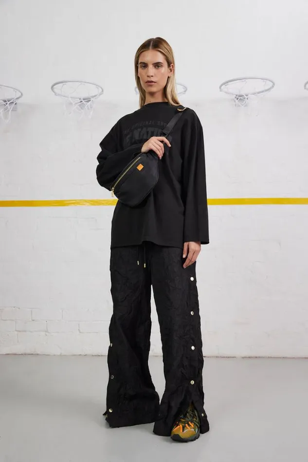 Shop VOLLEY PANT IN BLACK PE Nation Pants